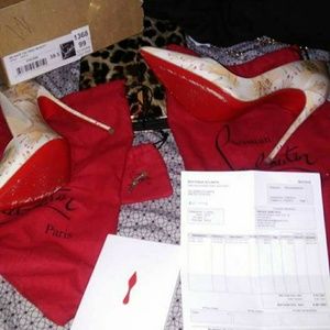 Authentic pair of So Kate CL heels